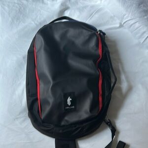 Cotopaxi Chasqui 13L Sling, excellent condition. Black with red & purple accents